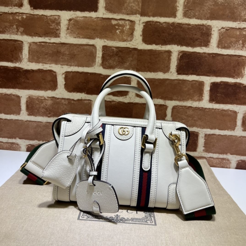 G*u*i top handle bags